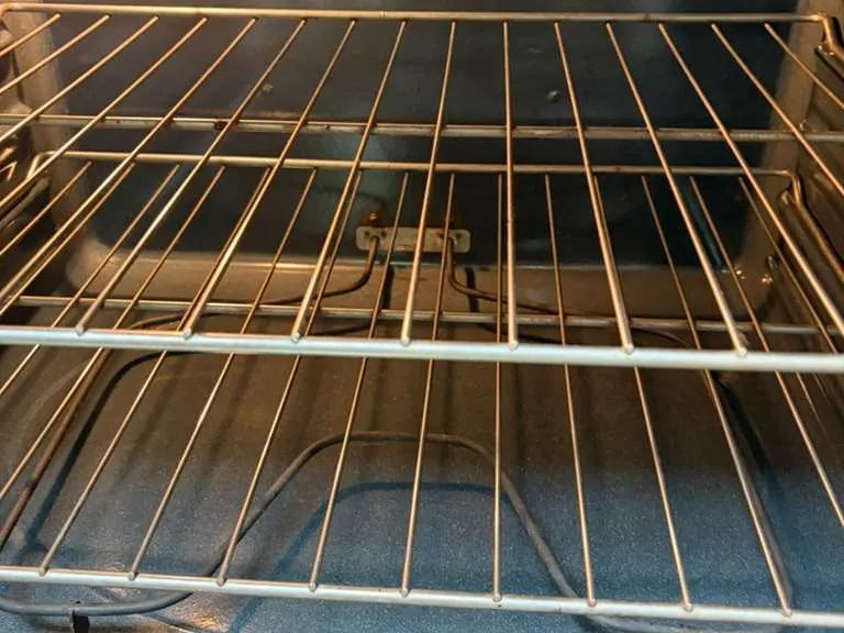 After apartment cleaning - spotless oven interior in a San Diego apartment