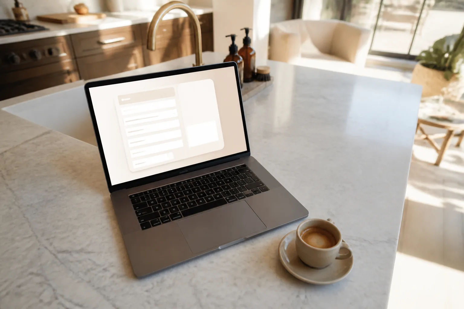 Laptop on a San Diego apartment kitchen island ready to book cleaning online